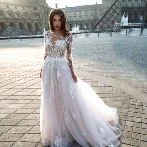 Gorgeous Lace Applique See Through Blush Lace Long Sleeves Wedding Dress with Crystals Sexy Bridal Gowns