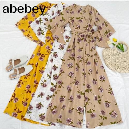 2021 New Summer Women Fashionable All-match V-neck flower print Jumpsuit waist strap flared sleeve Jumpsuit casual Pants