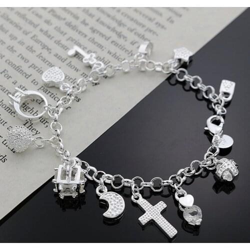 Beautiful fashion Elegant silver color 13 pendant charms moon star cross crystal Bracelet high quality Gorgeous jewelry H144
