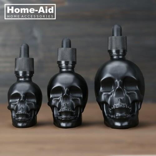 30ml 60ml 120ml Skull Bottle Bitter Bottle E Liquid Frosted Black Skull Shape Glass Dropper Bottle With Child Proof
