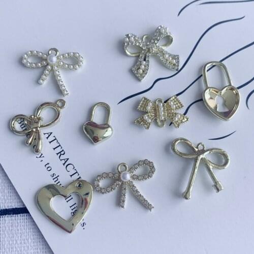 DIY alloy plating accessories wholesale gold diamond-encrusted pearl bow pendant earring accessories