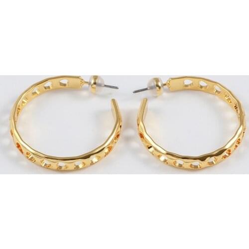 European and American fashion creative metal wind gold-plated glossy hollow semicircle girl temperament earrings earrings