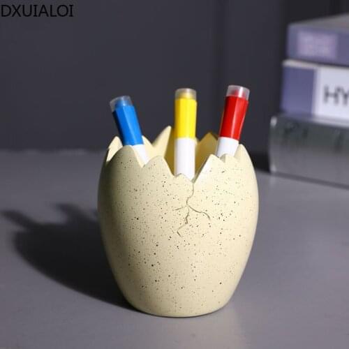 Creative childrens pen holder storage box student personality dinosaur egg desktop ornaments home decoration resin pen barrel