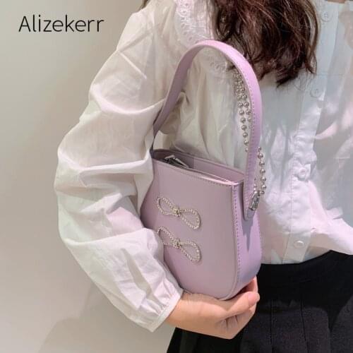 Cute Bow Diamonds Saddle Shoulder Bag Women 2021 New Designer Korean Beaded Chain Half Moon Crossbody Bag Fashionable Purses