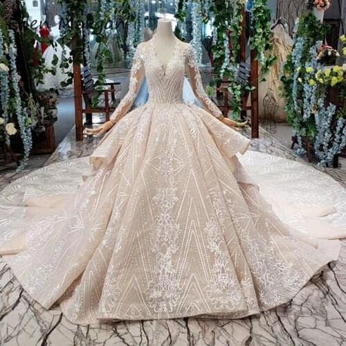 LuxuryLace Ball Gowns Wedding Dresses 2020 Ruffles Crystals V Neck Long Sleeves Champagne Open Back Corset for Bridal Women