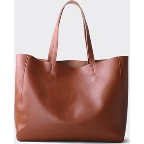 Bag female 2019 new shoulder bag leather big bag European and American simple head layer coinskin big capacity commute