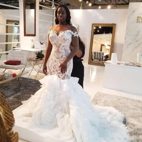 Top Illusion Long Sleeve African Mermaid Lace Wedding Dresses 2021 Ruffles Tiered Cathedral Train Trumpet Bride Wedding Gown