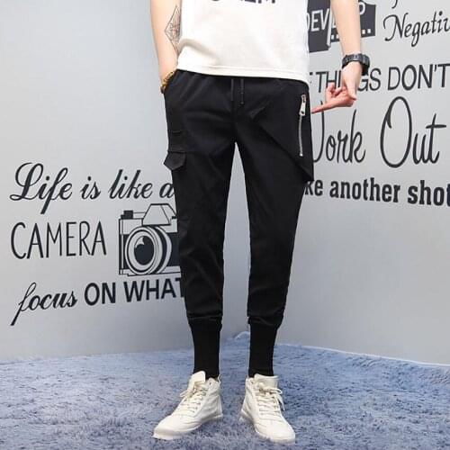 28-44 Spring Mens Student Black Casual Pants Stereoscopic Stickers Pocket Feet Harem Pants Tide Elastic Beam Pants Tide Costume