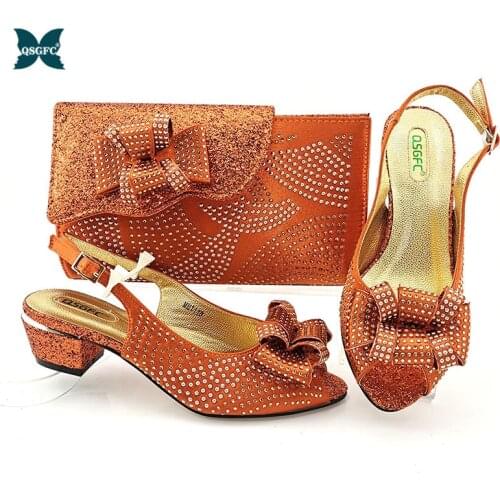 Italian Design Nigerian 2021 Lastest Party Orange Color Ladies Shoes and Bag Set Decorated With Narrow Band and Cross-tied