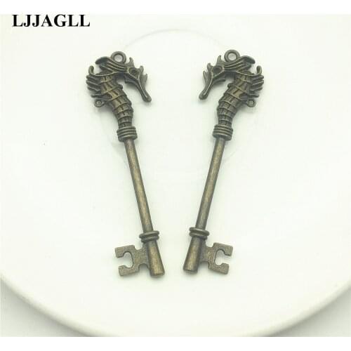LJJAGLL 4pcs/lot 19*70mm Metal Alloy Bronze Animal Keys Jewelry Charms Seahorse Key Pendants Fit Keychain Diy Make AYS027