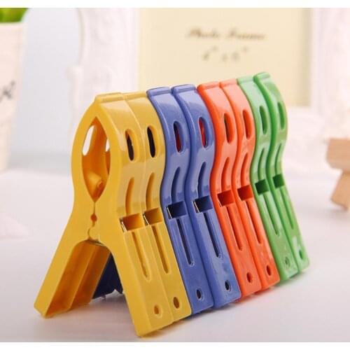 Hot 8ps/set Plastic Hanger Clips Laundry Clothes Powerful Laundry Clips Beach Towel Pins Spring Clamp Large Caught Big Clips