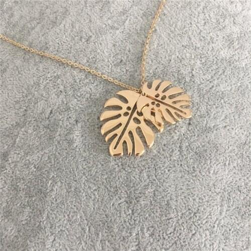 Trendy gold color two palm tree leaf pendant necklace for woman girl