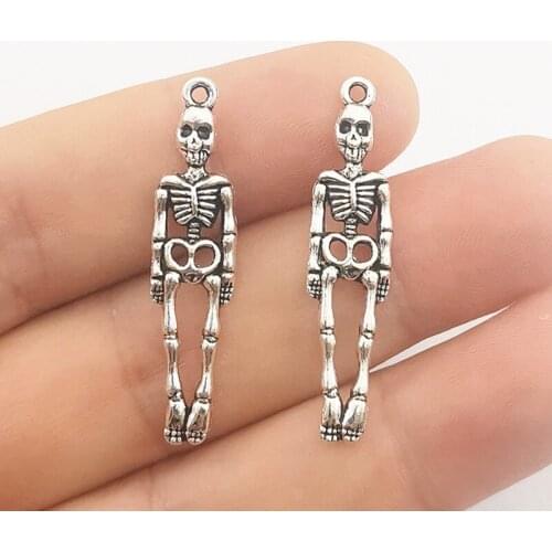 JINDINSP 12pcs Charms Skull Skeleton Man 39x9mm Antique Silver Color Plated Pendants Making DIY Handmade Tibetan Finding Jewelry