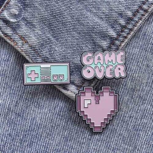Cartoon Heart Pink Purple Pixel Gamepad Brooches GAME OVER !Brooch Enamel Pins Shirt Lapel Pin For Friends Female Male Badge