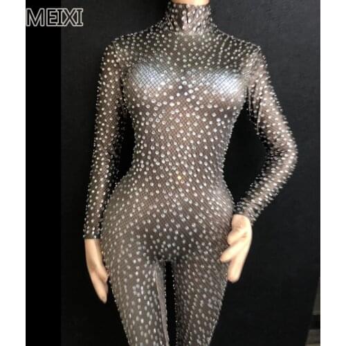 Sparkly reticulated black sky stars studded with rhinestone jumpsuit bar gala concert singer/dancer costumes