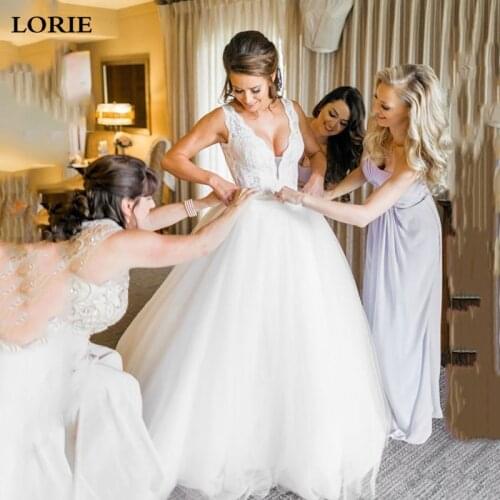LORIE Princess Wedding Dress 2019 V Neck Appliqued Lace Puff Tulle Boho Wedding Bride Dresses With Crystal Sash