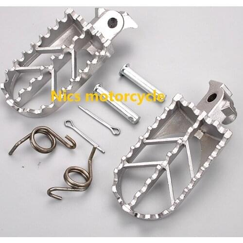 A pair stainless steel Modified Motorcycle Motocross Front Teeth Foot Pedals Footrest