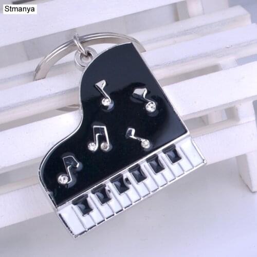 Hot Men Popular Piano key chain New metal Keychain with Crystal Business gift car key ring party gift Jewelry K2020