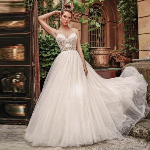 Glitter Tulle Wedding Dresses Princess Boho Beach Spaghetti Straps Sexy Backless A Line Long Bridal Bride Gowns Beaded Appliques