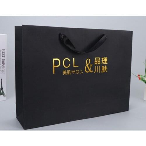 Competitive price New Gold Logo Hot Foiled Stamping Black Matt Kraft Paper Bag With Cotton Rope Handles --XP2037