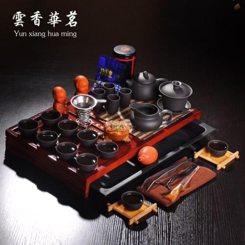 A complete set of tea set purple ceramic teapot teacup set of office solid wood tea tray on sale