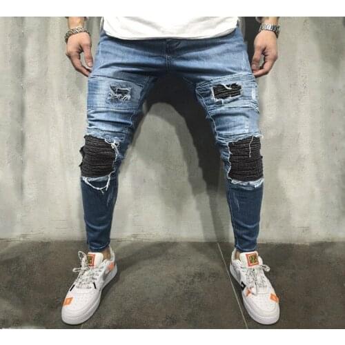 Spring autumn men jeans pleated hole hip-hop jeans pencil pants fashion washed zipper mid-waist blue jeans men denim trousers