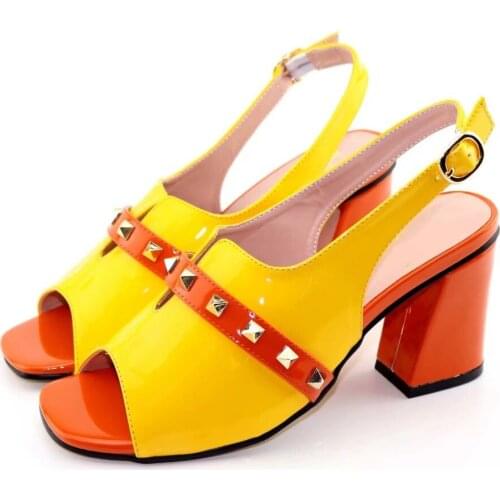 Wonderful yellow women pumps with metal rivet decoration african dress shoes for party V8105,heel 8CM