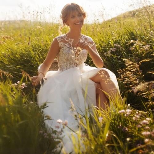 Puls Size Tulle A-line Wedding Gowns 2021 O-neck Appliques Sweep Train Button Back Sleeveless Bridal Dresses