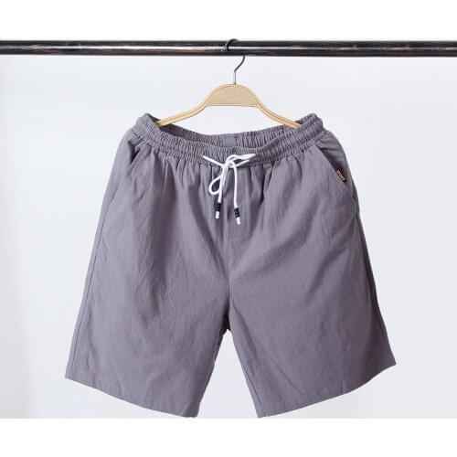 NEW 2020 Summer thin quick drying Active Elastic Waist Drawstring Solid color shorts cotton men loose leisure beach shorts 5XL