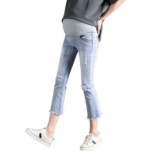 2019 spring and summer pregnant women denim cropped trousers Korean version of the stomach lift bell pants hole eight pants