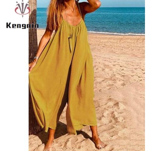 New 2021 Summer European Style Women Loose Jumpsuits Oversized Sexy Strap Rombers Wide Leg Pants Female Bodysuit KE1468