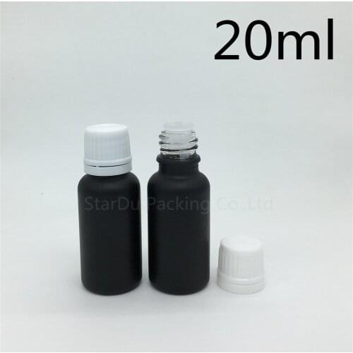 Free Shipping 500pcs 20ML Black Frosted Glass Bottle 20ml Vials Essential Oil Bottle white Plastic cover Perfume bottles