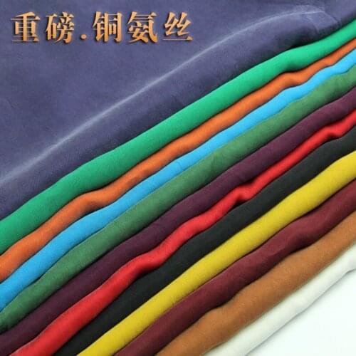 Summer air permeability of pure copper ammonia silk fabric color restoring ancient ways plain red pants fabric material