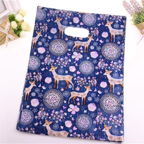 New Design Wholesale 50pcs/lot 25*35cm New Year Sac Cadeau Large Plastic Elk Christmas Packaging Bags With Handles