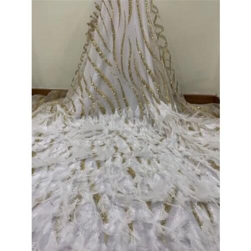 Fashion Glued glitter african net lace fabric with 3d feather New design YG-677 embroidery tulle fabric