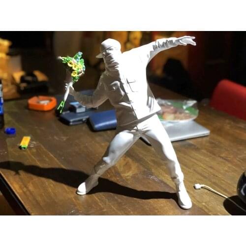 Banksy Medicom throws flower boys free white trend art sculptures to display pieces on Instagram as gifts