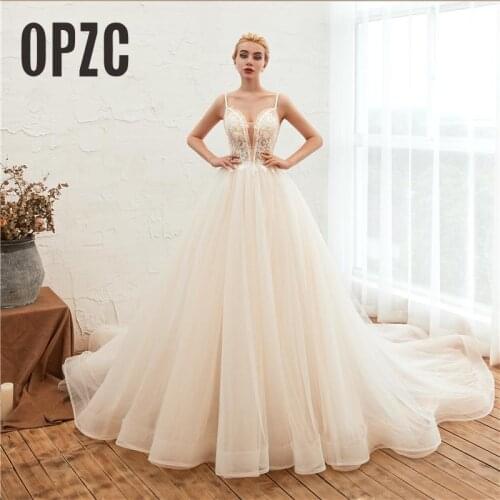 Spaghetti Straps Wedding Dress 2021 V Neck Bridal Gowns Backless Sleeveless Tull Appliques Lace Bride Dresses vestidos de noiva