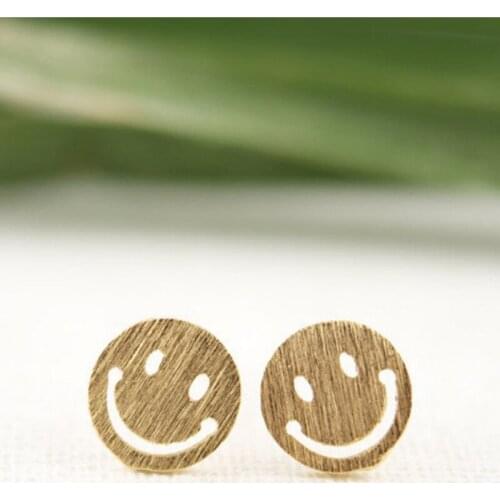 Fashion cartoon smiling face stud earrings
