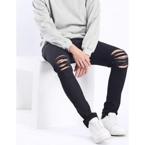 Tight stretch jeans man shredded jeans
