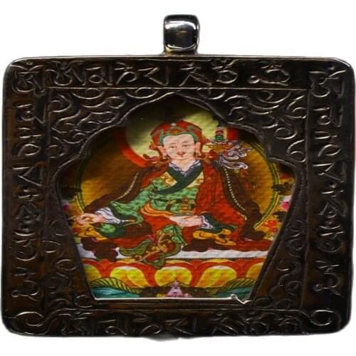 Early collection of Nepalese gilt hand-painted thangka buddha portrait pendant