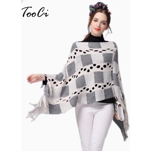 Spring and Autumn Women Hollow Plaid Tassels Sweater Ladies Tassels Poncho Long Knitted Pullovers Knitted Cape Coat