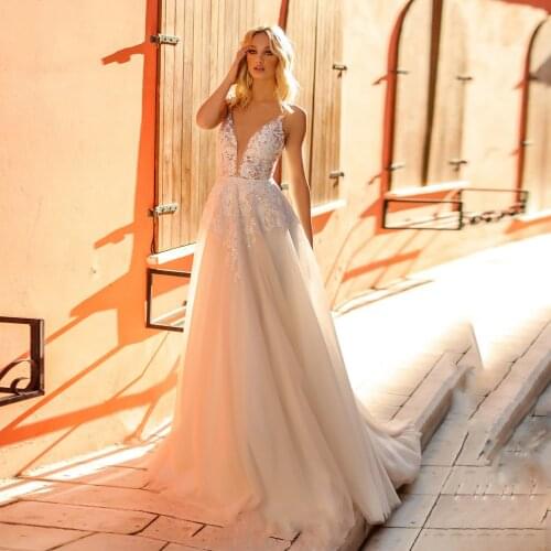 Beaded V-neck Straps Backless Wedding Dresses Off Shoulder A Line Lace Appliques Sleeveless Champagne Bridal Gowns Sweep Train