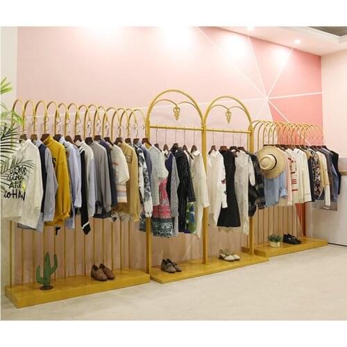 Golden display rack in Zhongdao clothing store