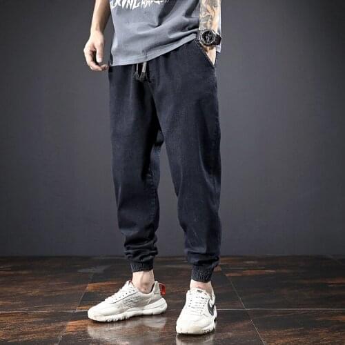 Streetwear Men Jeans Loose Fit Denim Fashion Cargo Pants Printed Designer Harem Trousers Vintage Hip Hop Jeans Men Joggers Pants