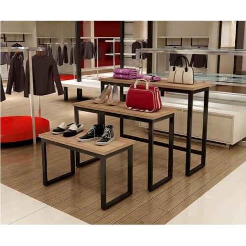 Clothing store high and low platform shopping mall display stand handbag and shoes rack running water table window nakashima