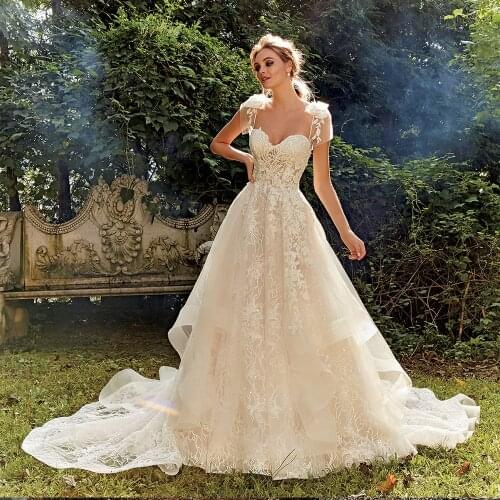 Shiny Lace A-Line Wedding Dress Vestidos De Bodas Sweetheart Neck Backless Illusion Bridal Gown Gelinlik