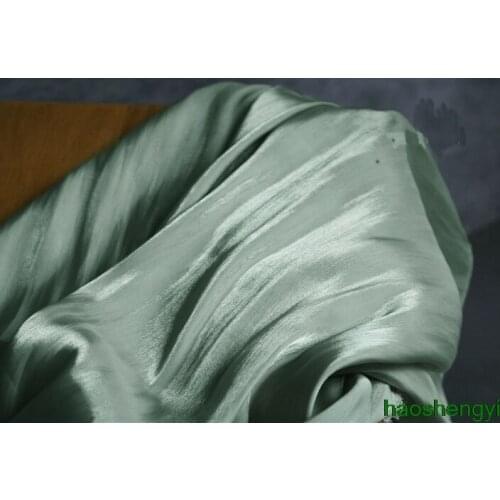 Bright cyan human skin crystal satin fabric, fashion design creative summer dress fashion fabric