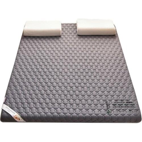 A simple mattress is laid on the floor, folded and directly placed on the ground