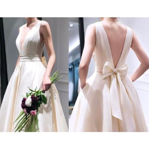 #1034 Wholesale Sleeveless Deep V-Neck Simple Satin Pleat Wedding Dress With Bow Back