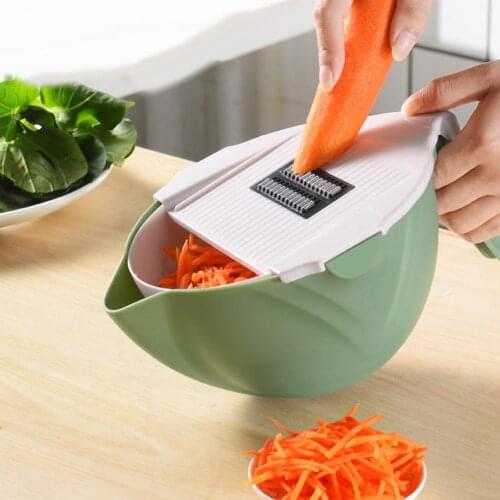 Kitchen Multifunctional Rotary Vegetable Potato Carrot Cutter Slicer Grater Automatic rotation angle. Can be split as a basket